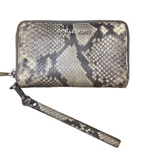 Micheal Kors leather zip around wristlet in natural python